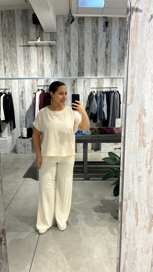 Pantaloni fluidi a palazzo con elastico sul retro panna - Altamira Milano